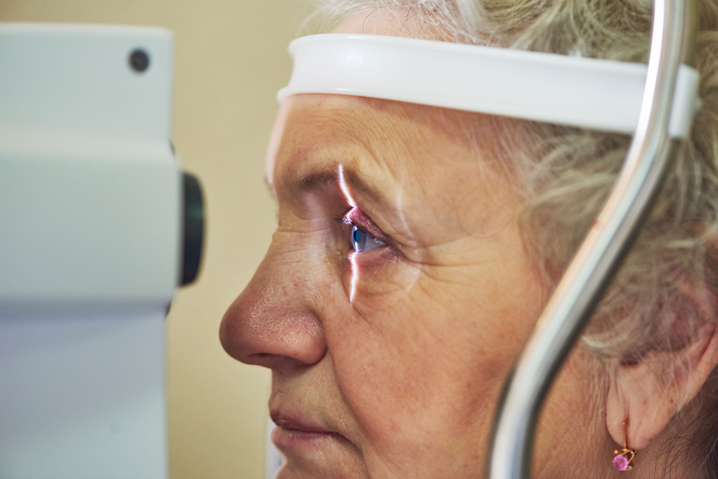 eyesight check of adult female woman